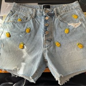 Super cute denim pineapple embellished shorts! Large
